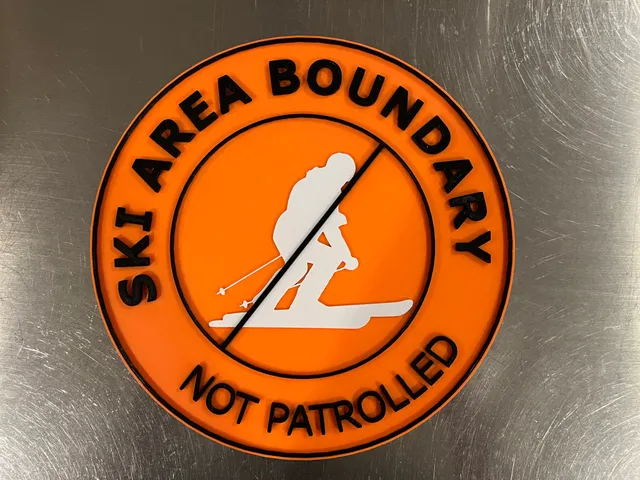 Ski area boundary sign