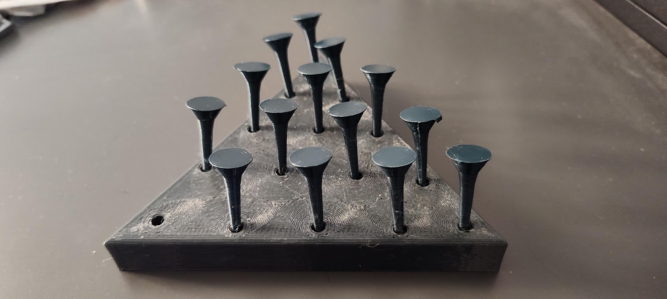 Tricky Triangle Peg Solitare Game