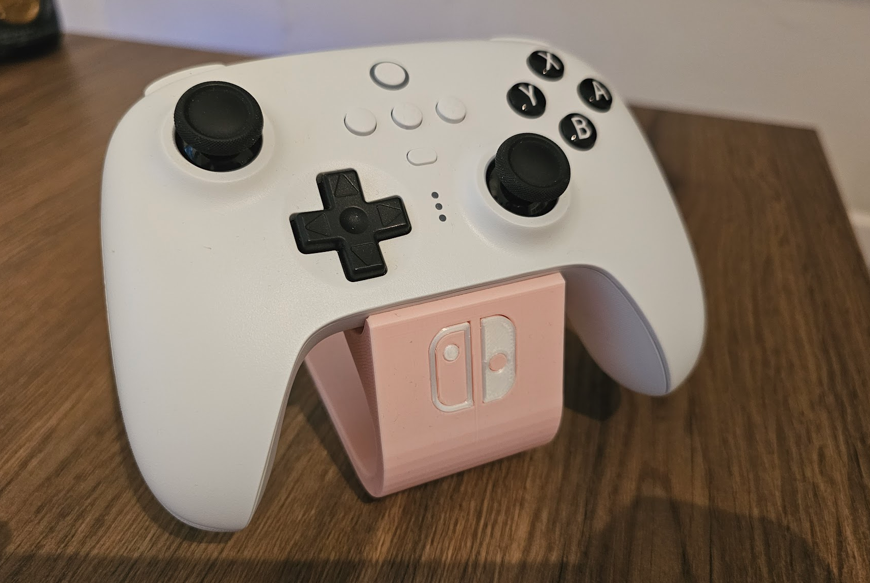 Nintendo Switch controller stand with logo