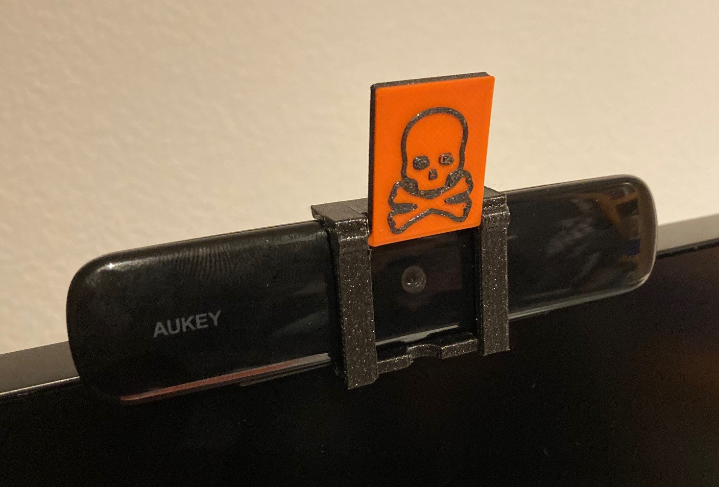 Webcam cover with alert (Designed for Aukey PC-W1 but adaptable)
