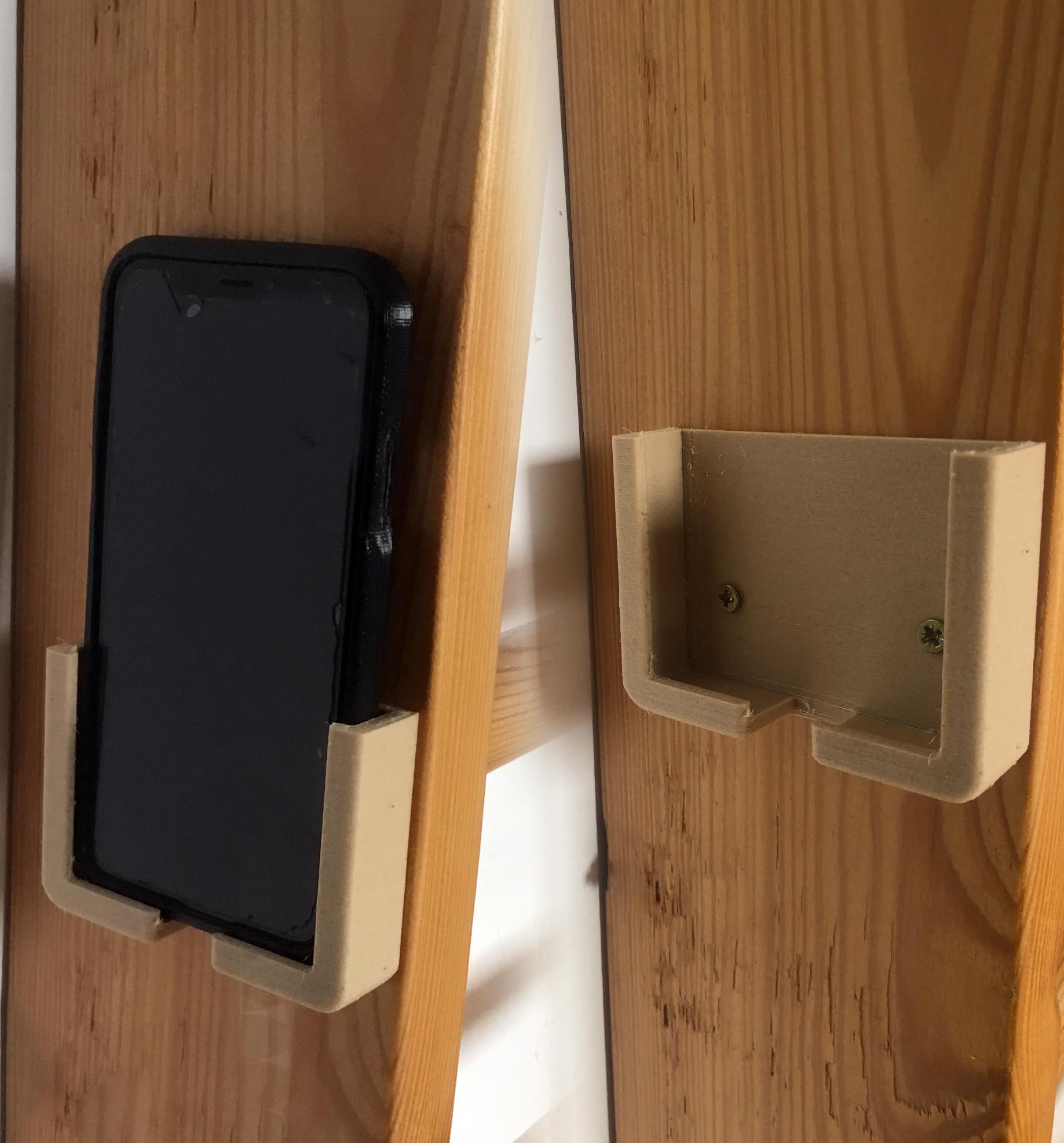 Wall phone holder