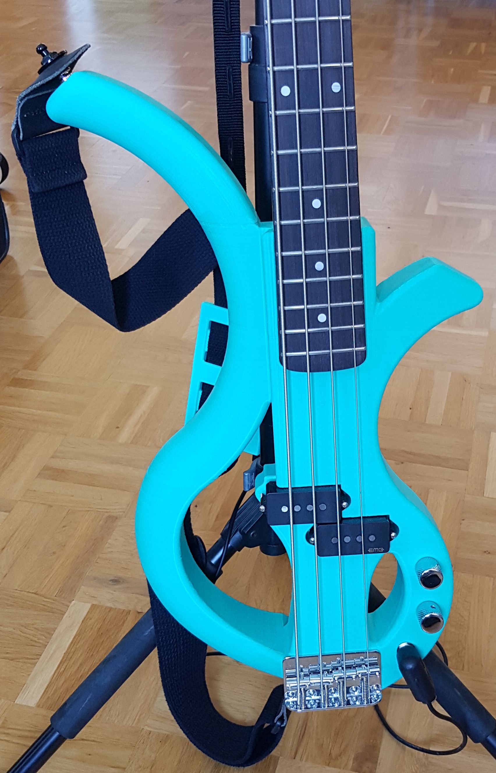 Electric Bass Guitar body with tilted fretboard for left hand comfort