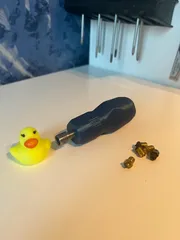 Screwdriver handle for nozzle changing