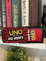 UNO Show 'Em No Mercy playing card game box
