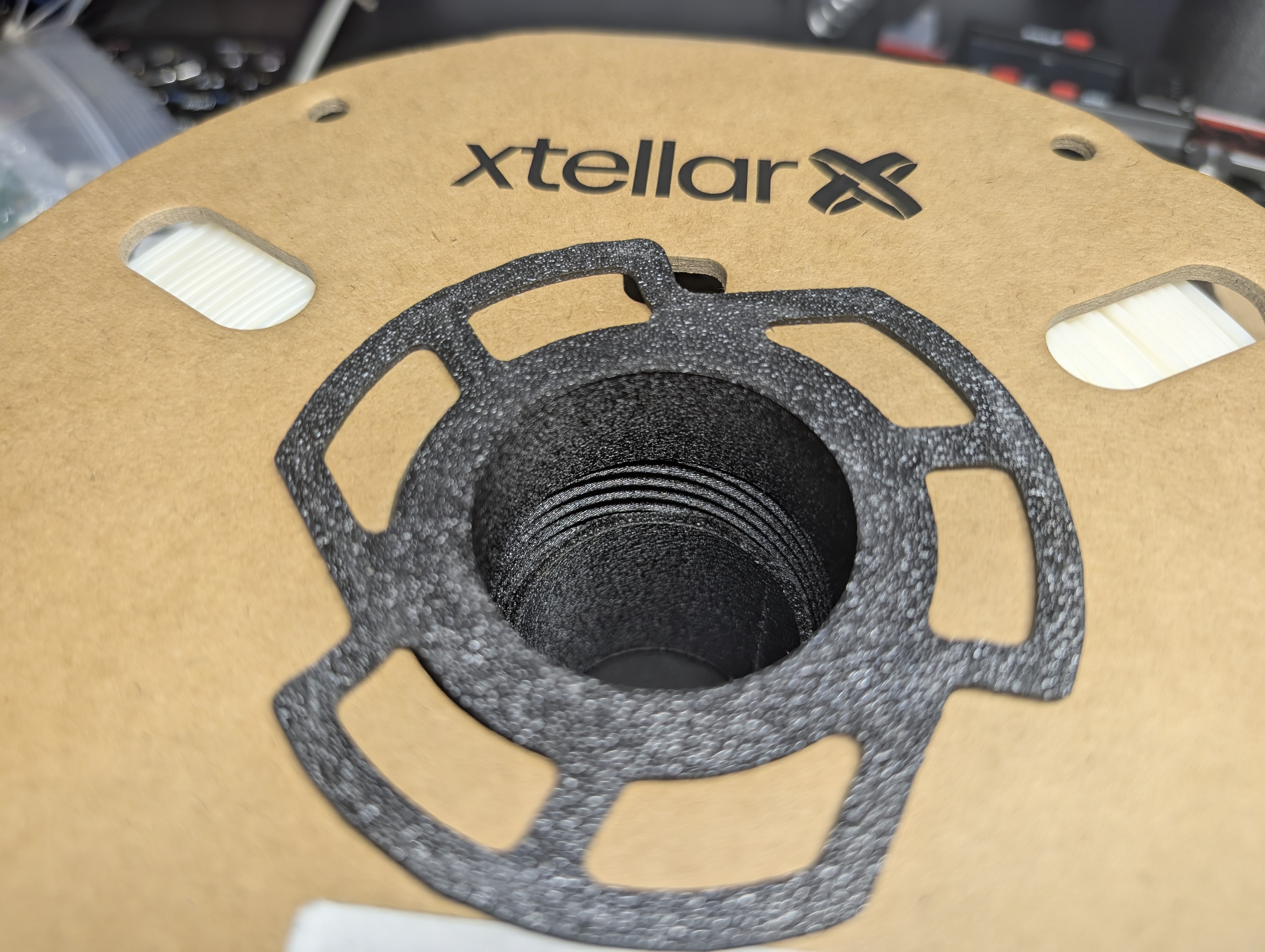 Lightweight cardboard spool brace for high temperature drying