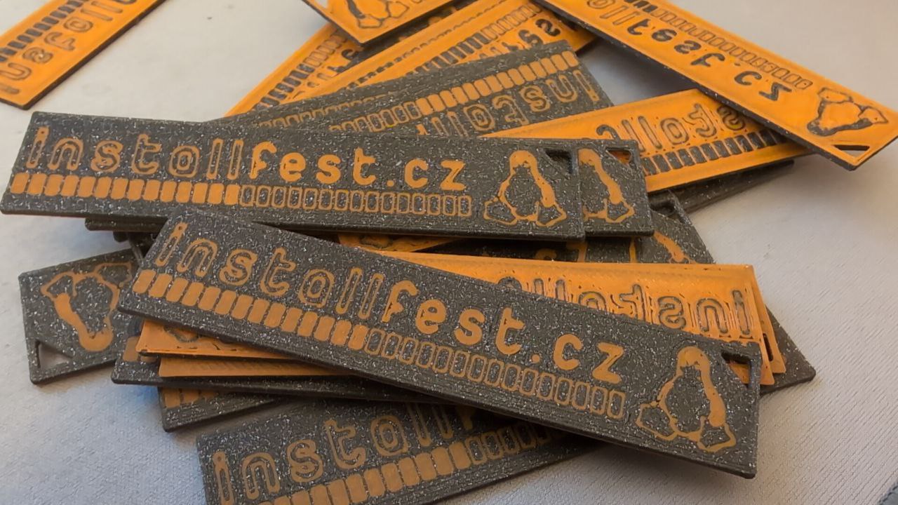 Tux Installfest conference badge/keychain
