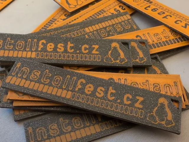 Tux Installfest conference badge/keychain