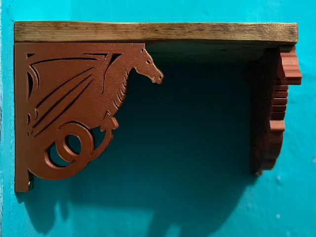 Dragon shelf holder