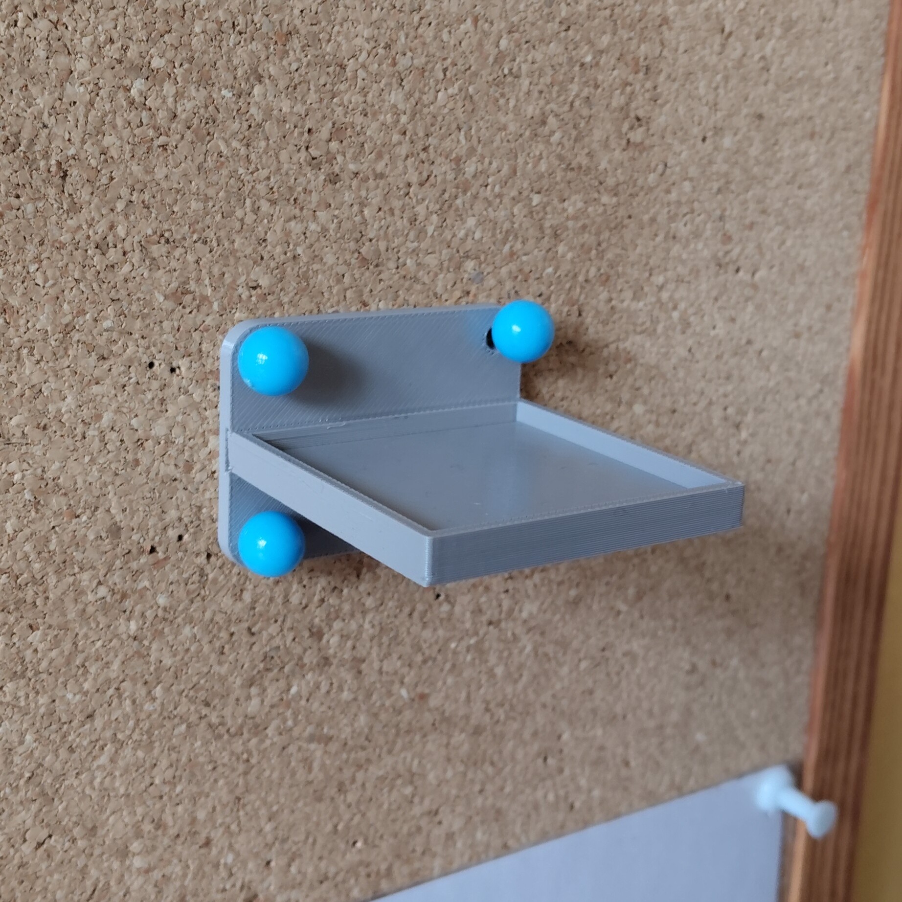 Display stand for a bulletin board.