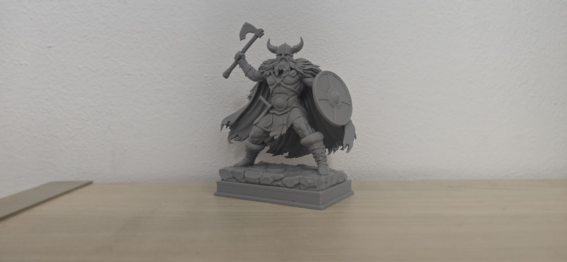 Viking Warrior with Axe and Round Shield