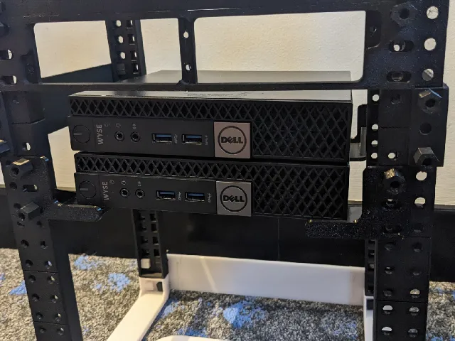 Simple 1U rack mount holder or shelf