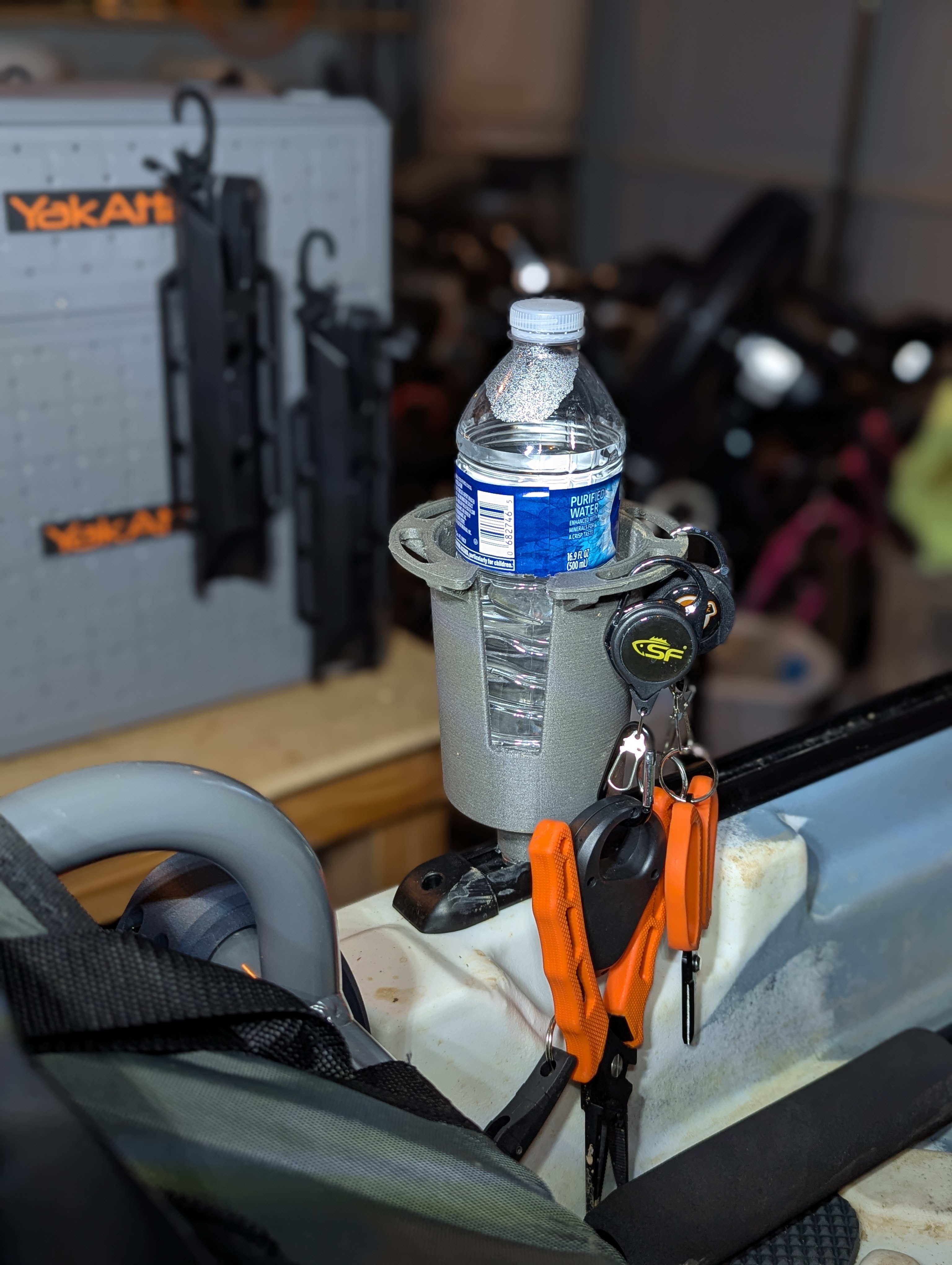 Gear track cup holder