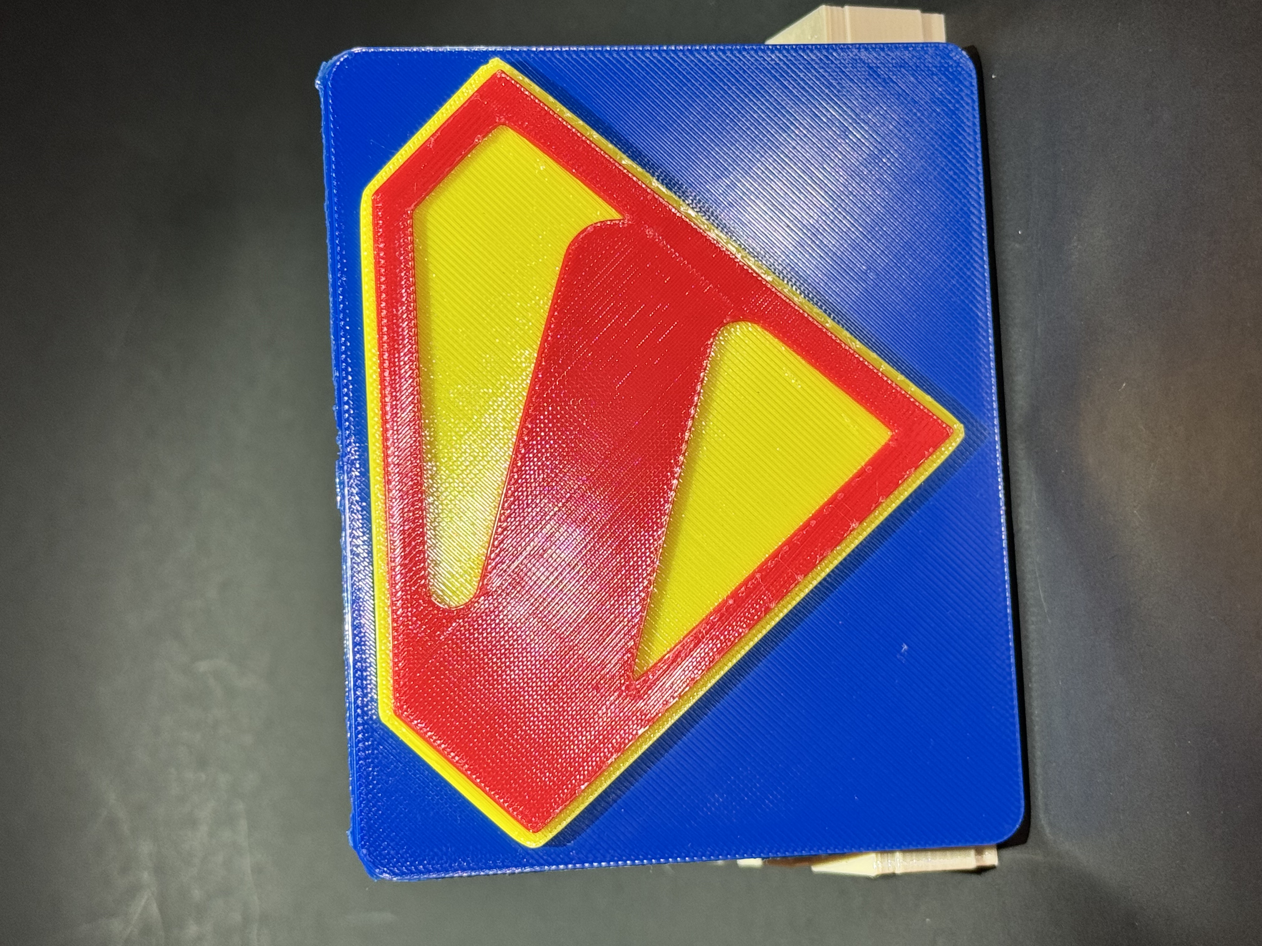 Superman movie collectors logo plate