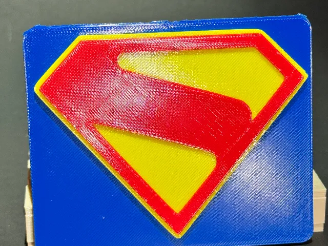 Superman movie collectors logo plate
