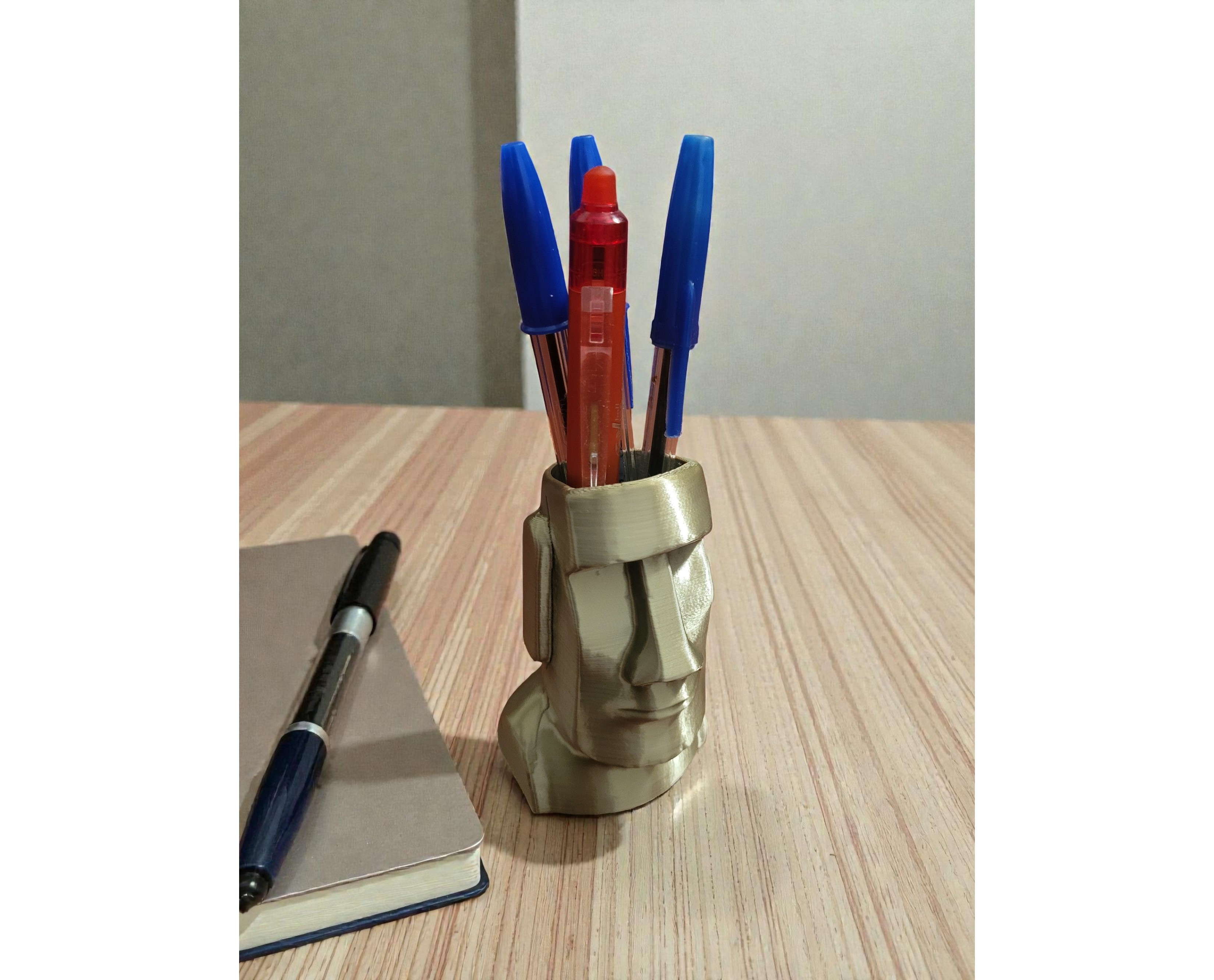 Moai face pen holder