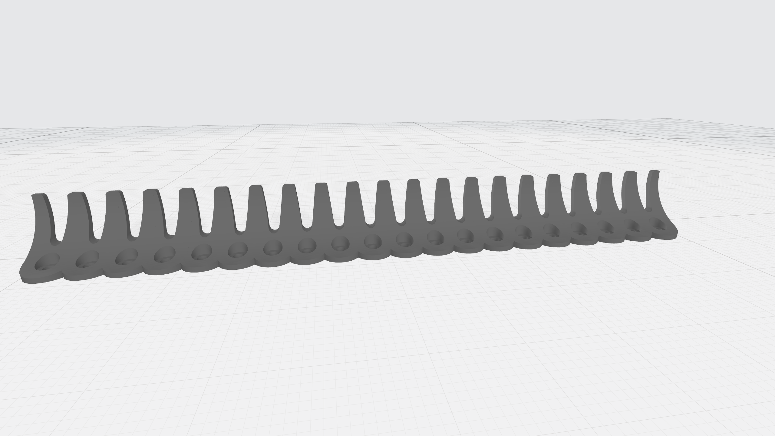 Cable Holder/Array of small wall hooks
