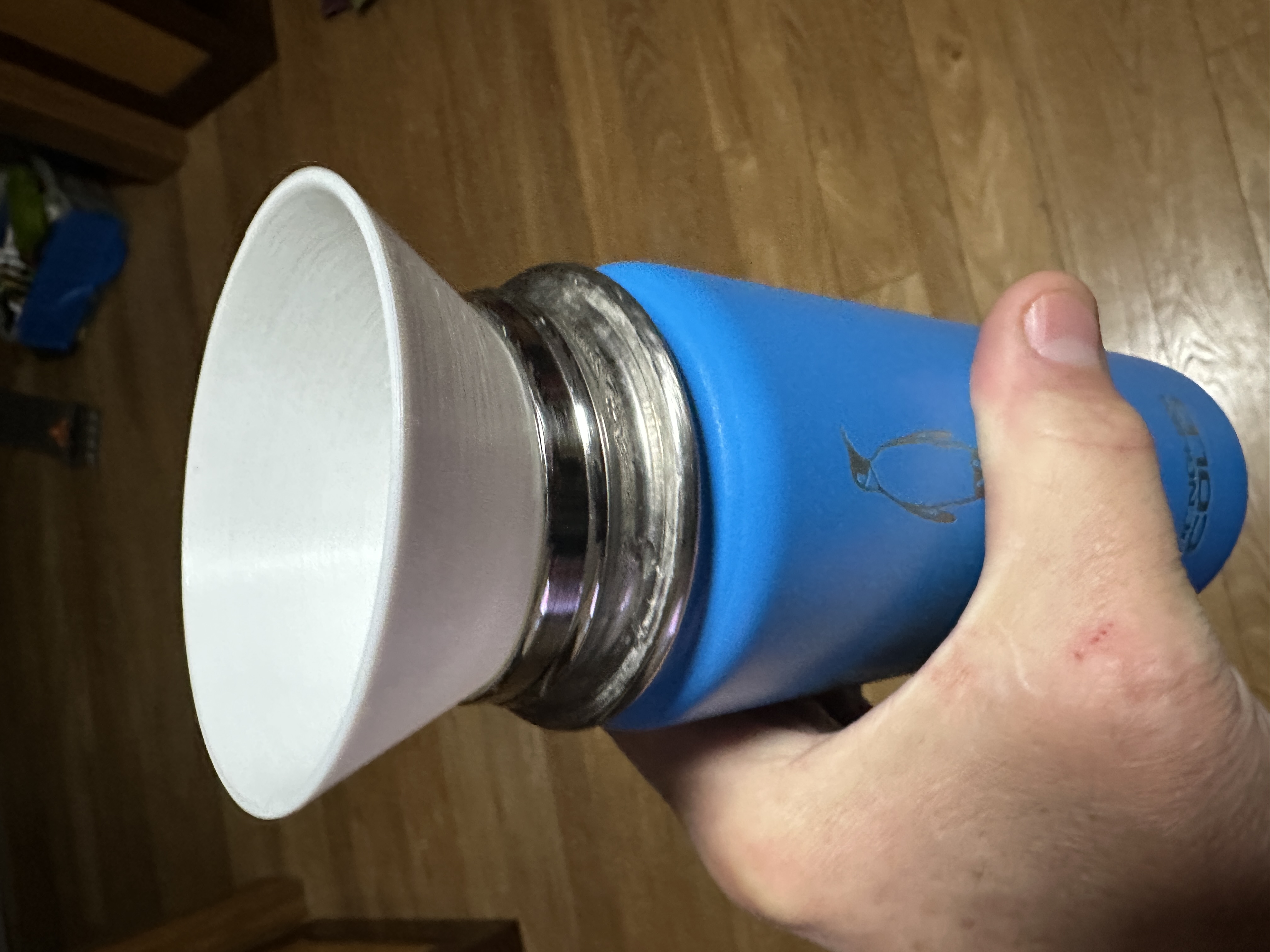 Water bottle funnel for ice dispensers
