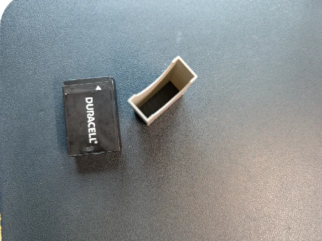Cover for LP-E12 Li-ion battery