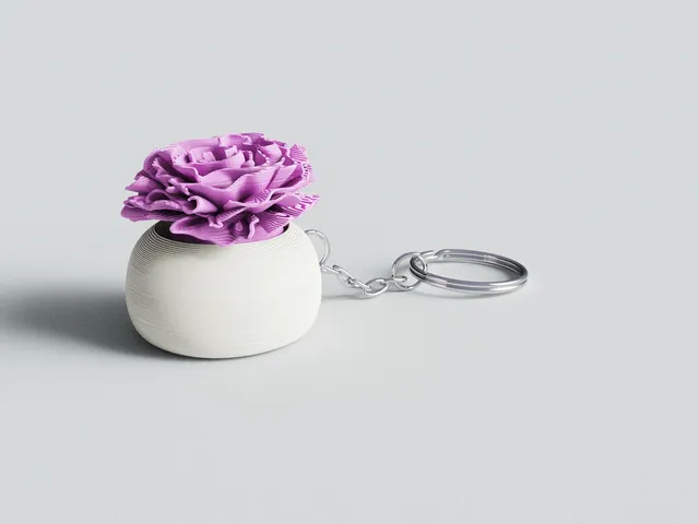 Llavero Fidget Clicker en forma de Clavel – Juguete Antiestrés Mecánico