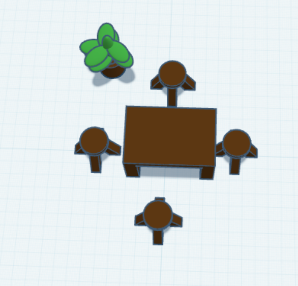 Table chairs and plant
