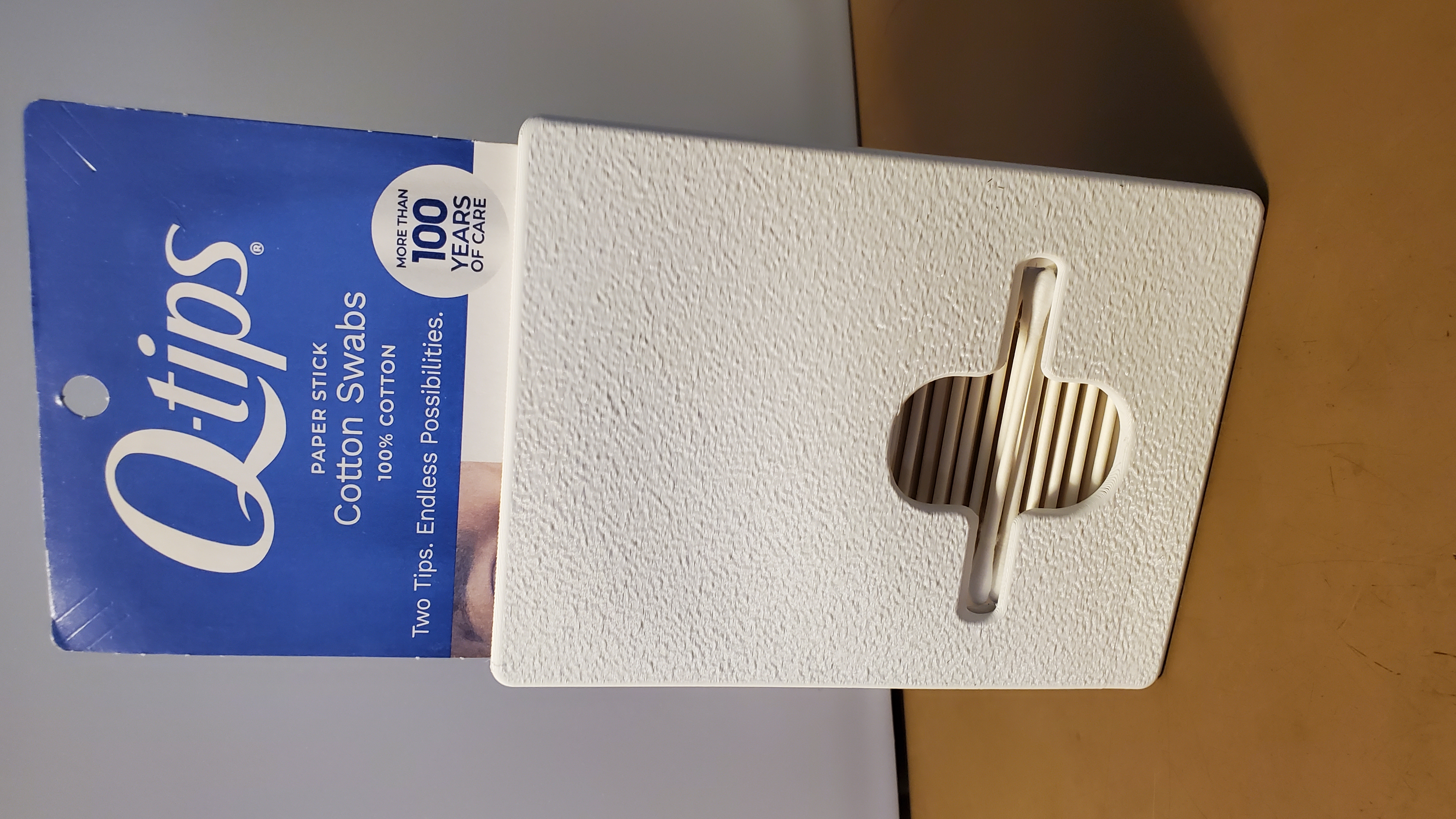 Qtip dispenser for package