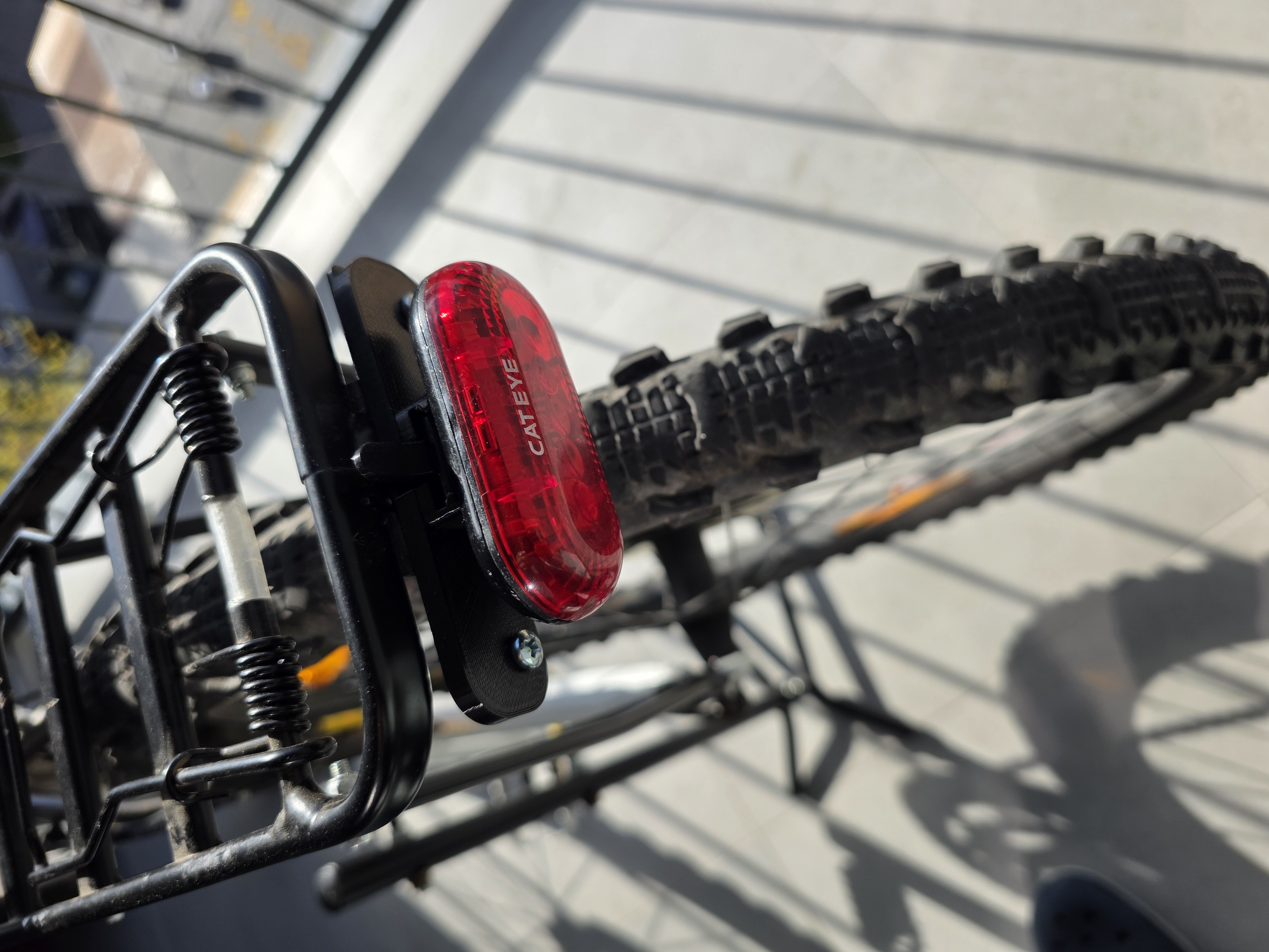 Cateye rear light mount for bike racks