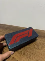 Caja F1