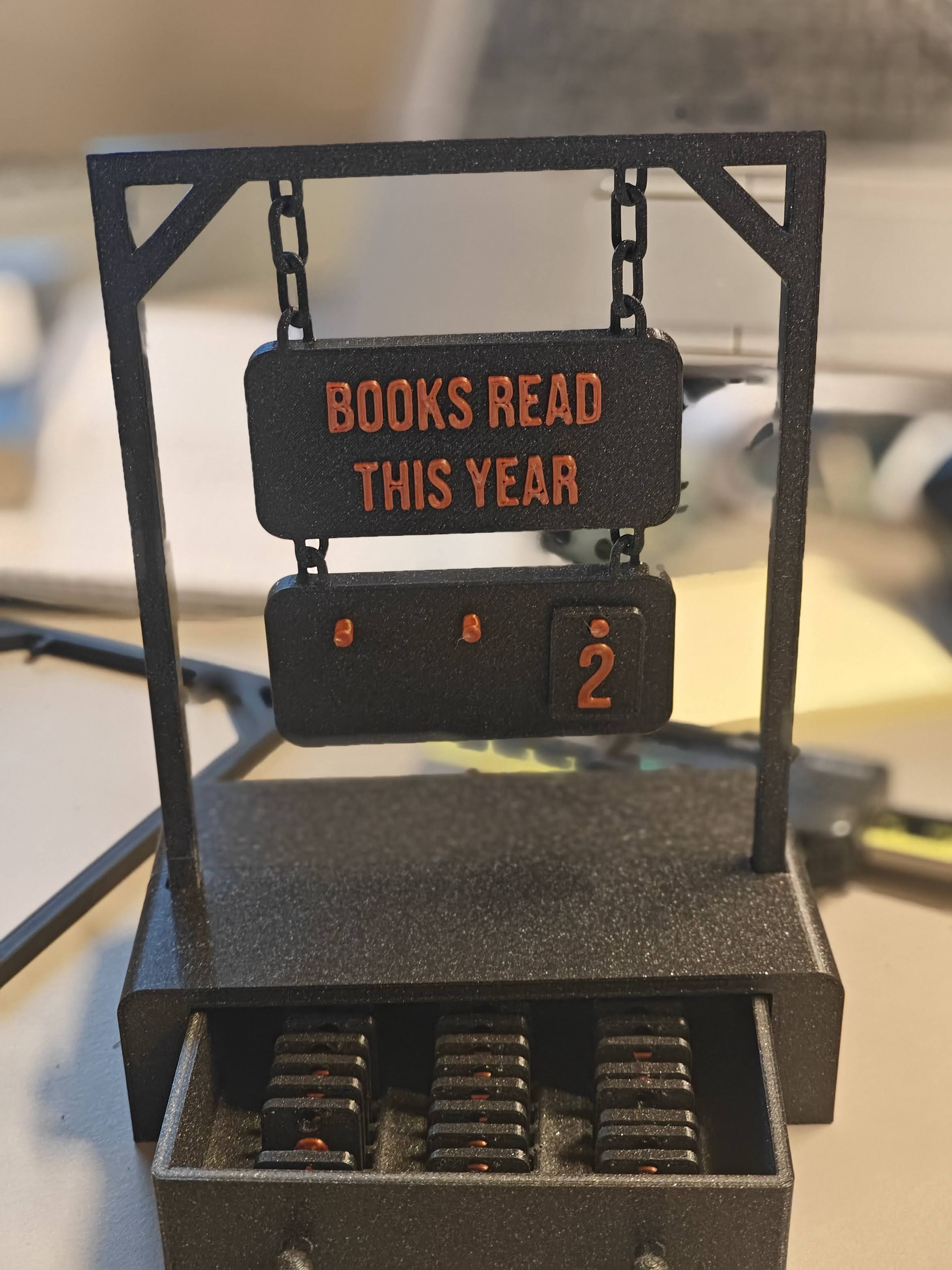 Hanging sign book tracker