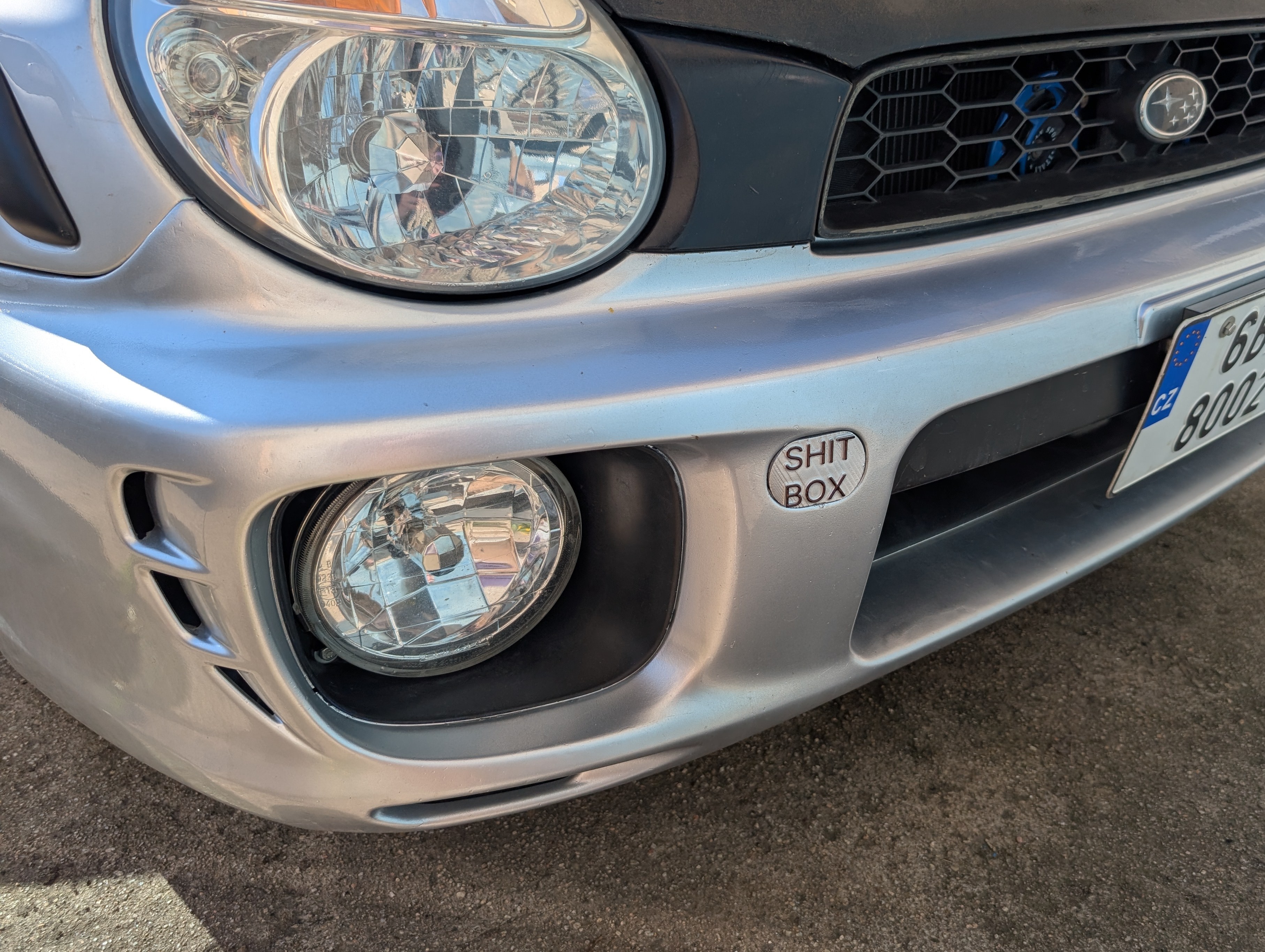 Front towhook covers for Subaru sedan (57731FE080) and wagon (57731FE070)