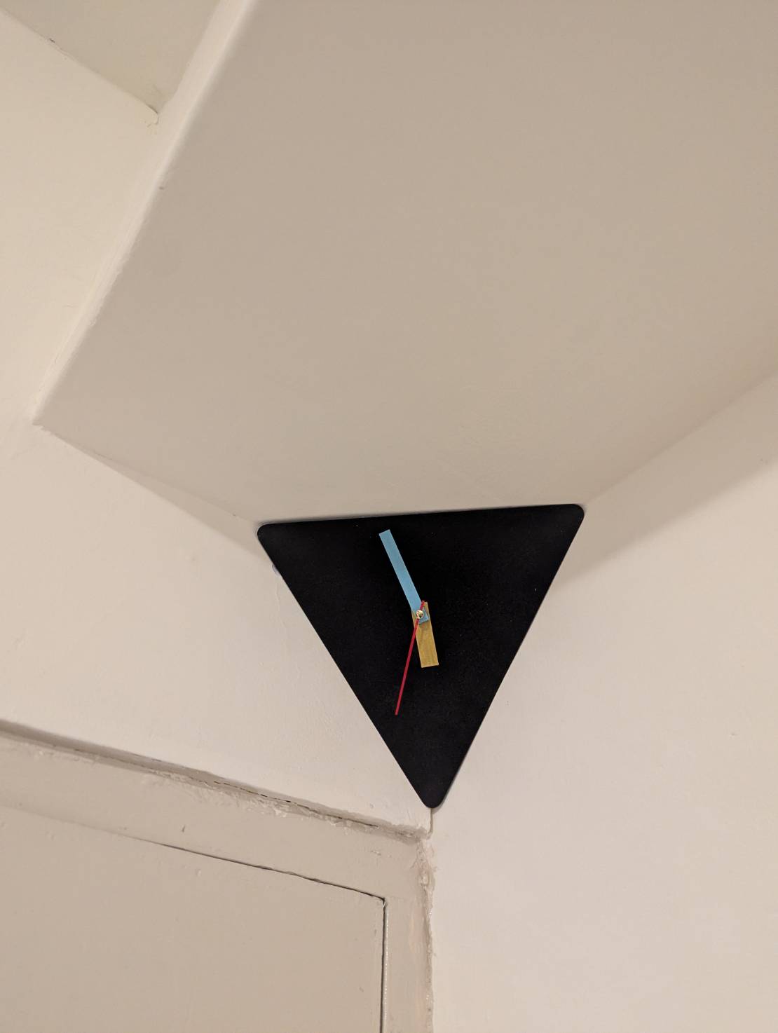 Ceiling corner clock