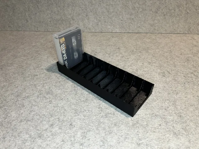 Stand holder for DAT cassette tapes