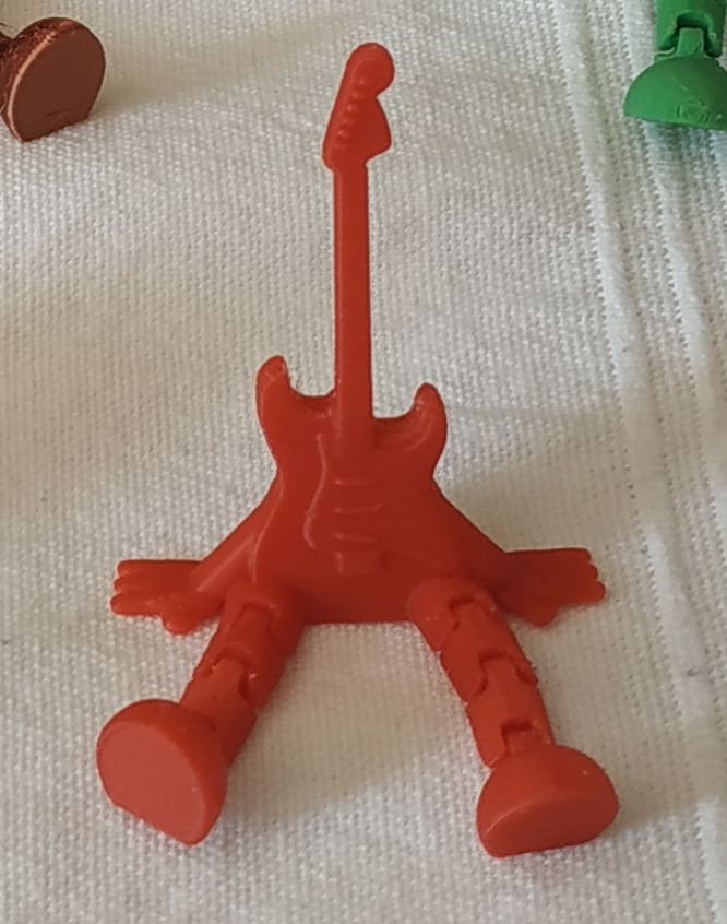 Electric guitar with feets and hands