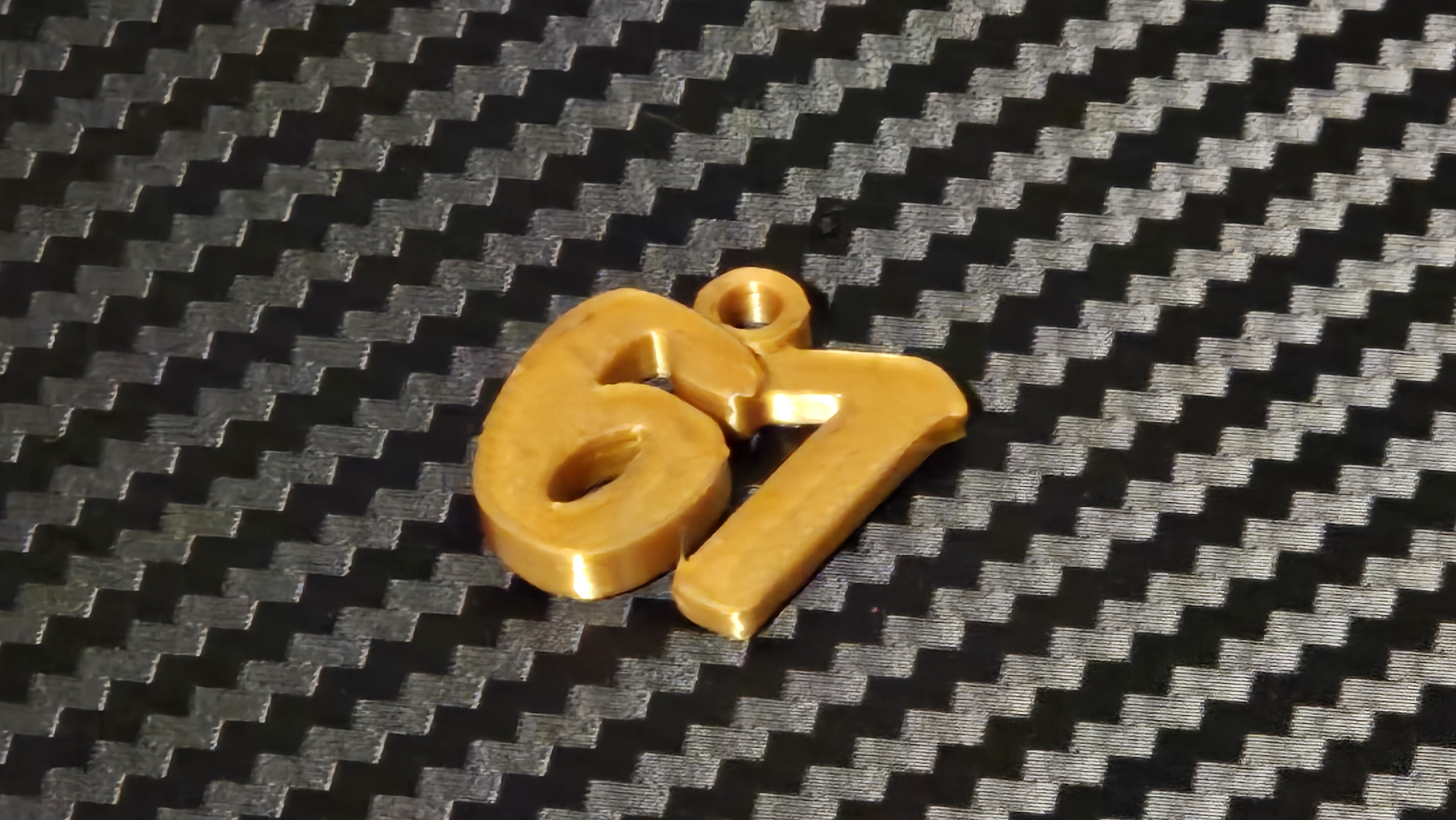 67 (six-seven) Charm or Ornament