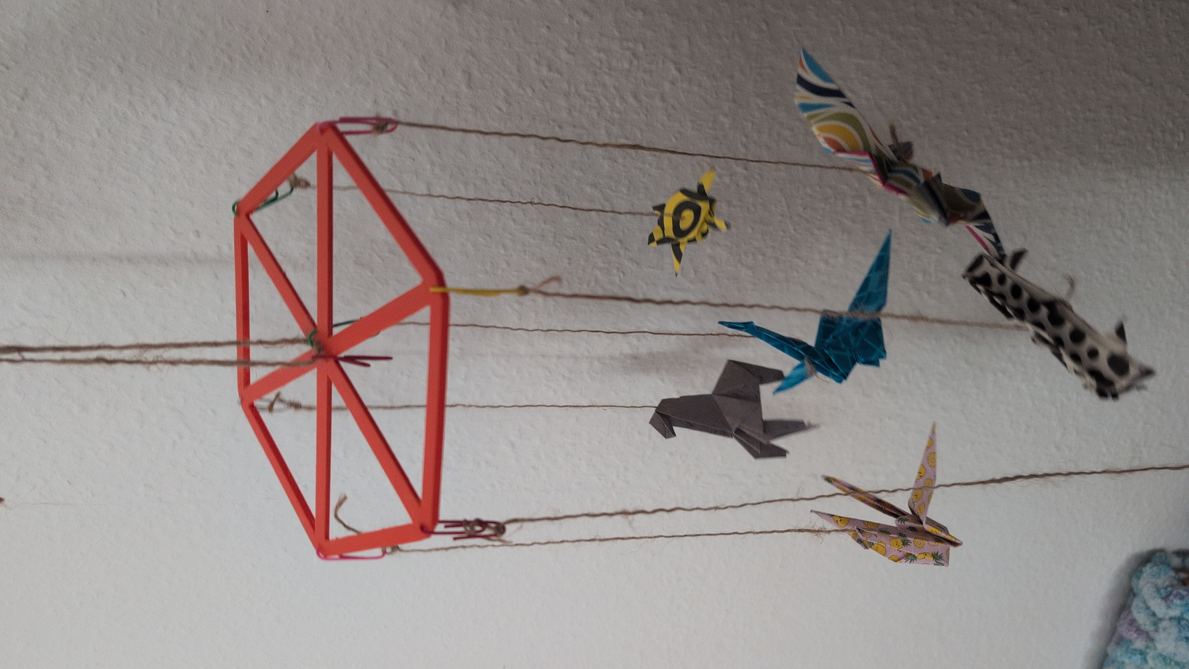 Baby mobile with origami's and paperclips