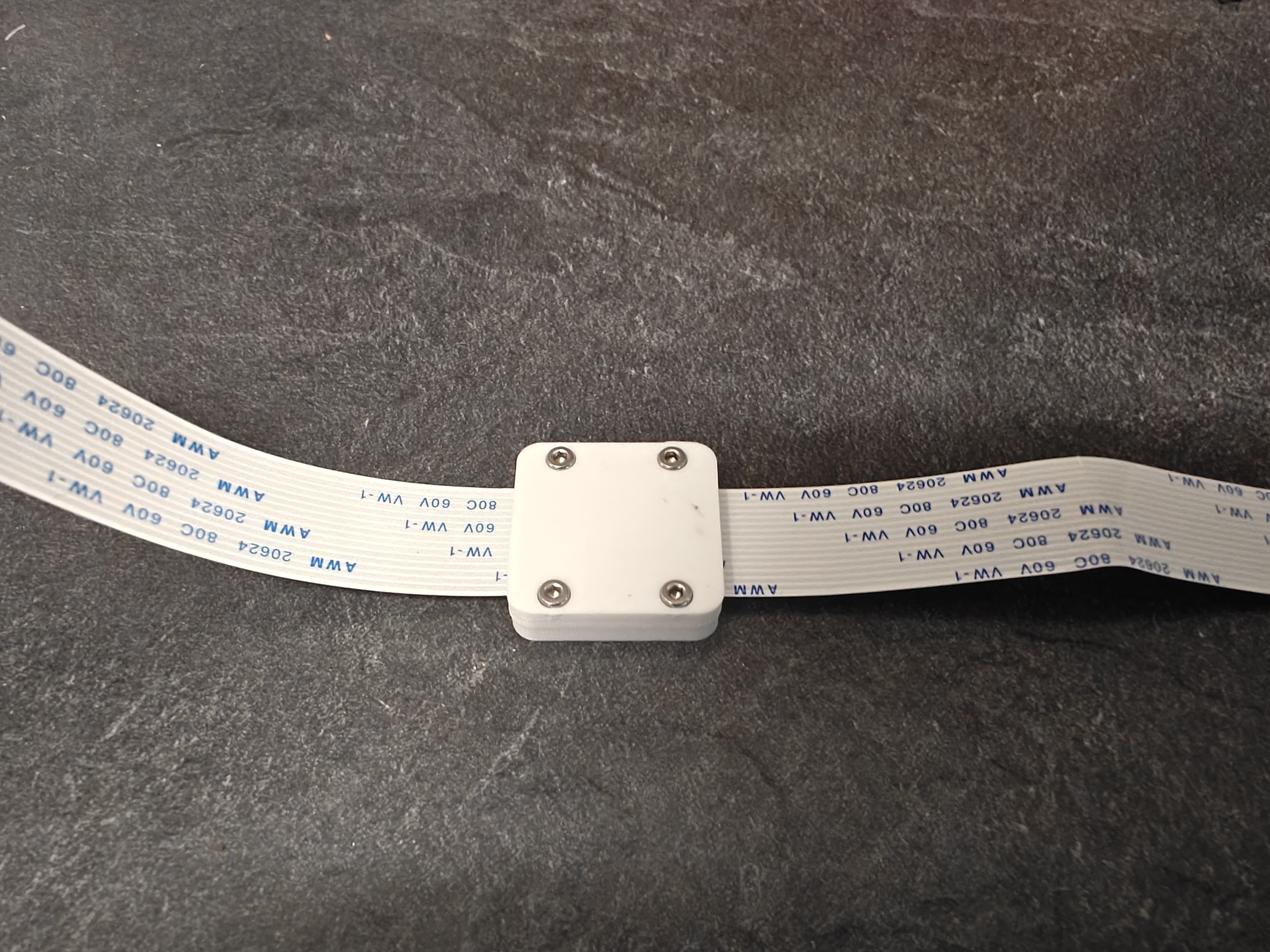 Raspi camera cable joiner clamp