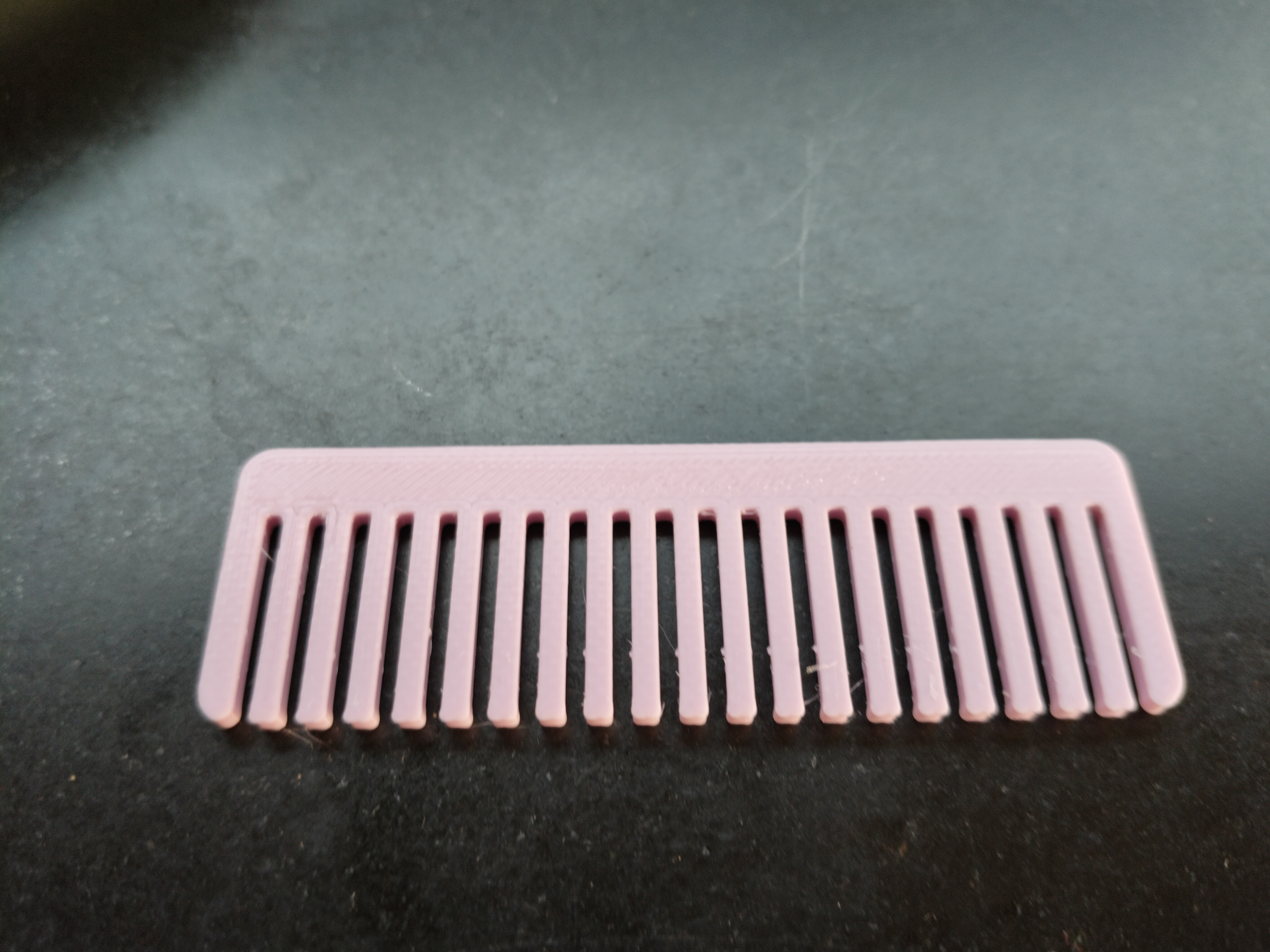Wide tooth comb for coiling hair