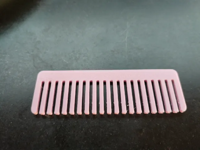 Wide tooth comb for coiling hair