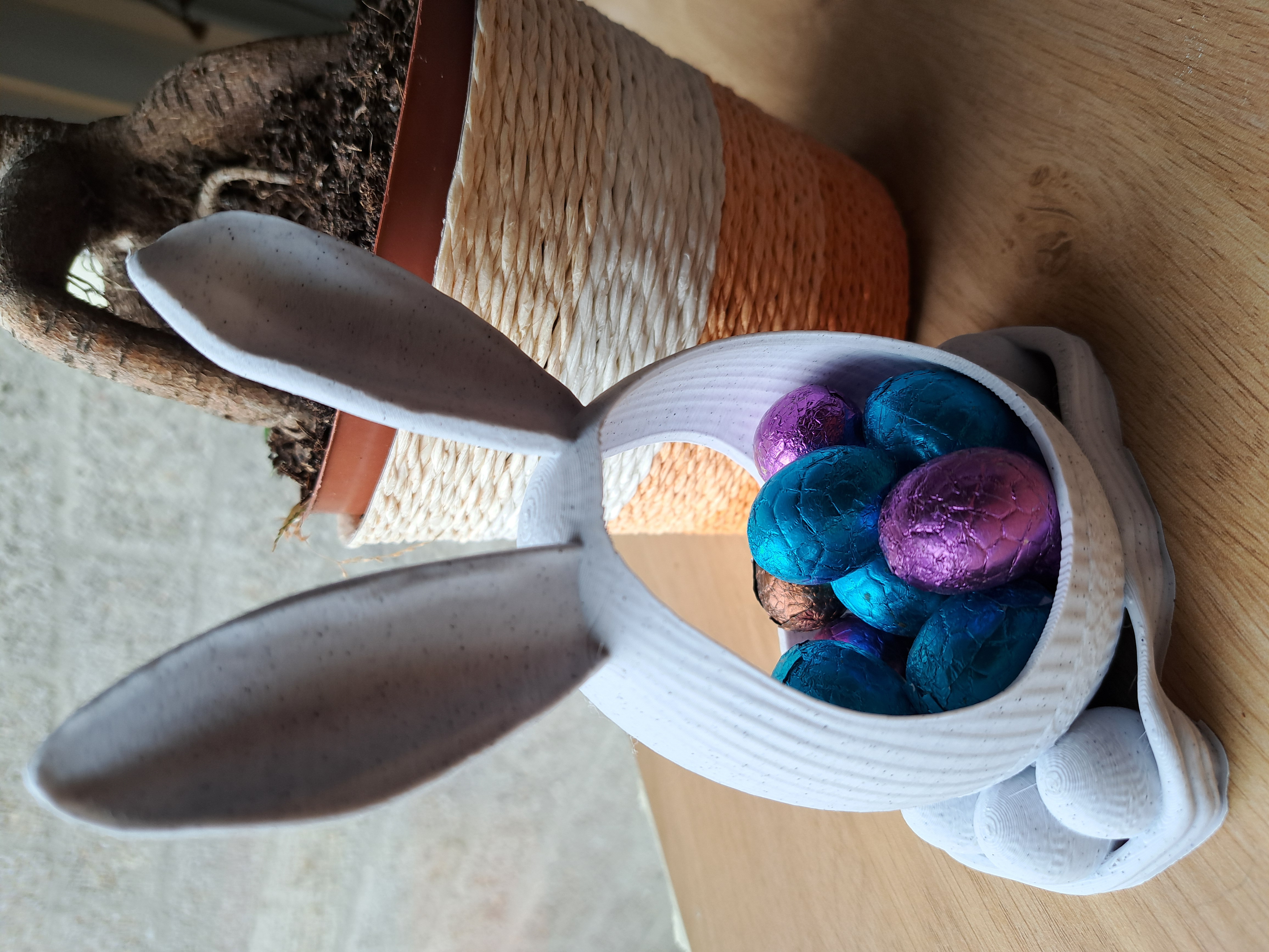 Happy Easter egg with bunny ears candy plate
