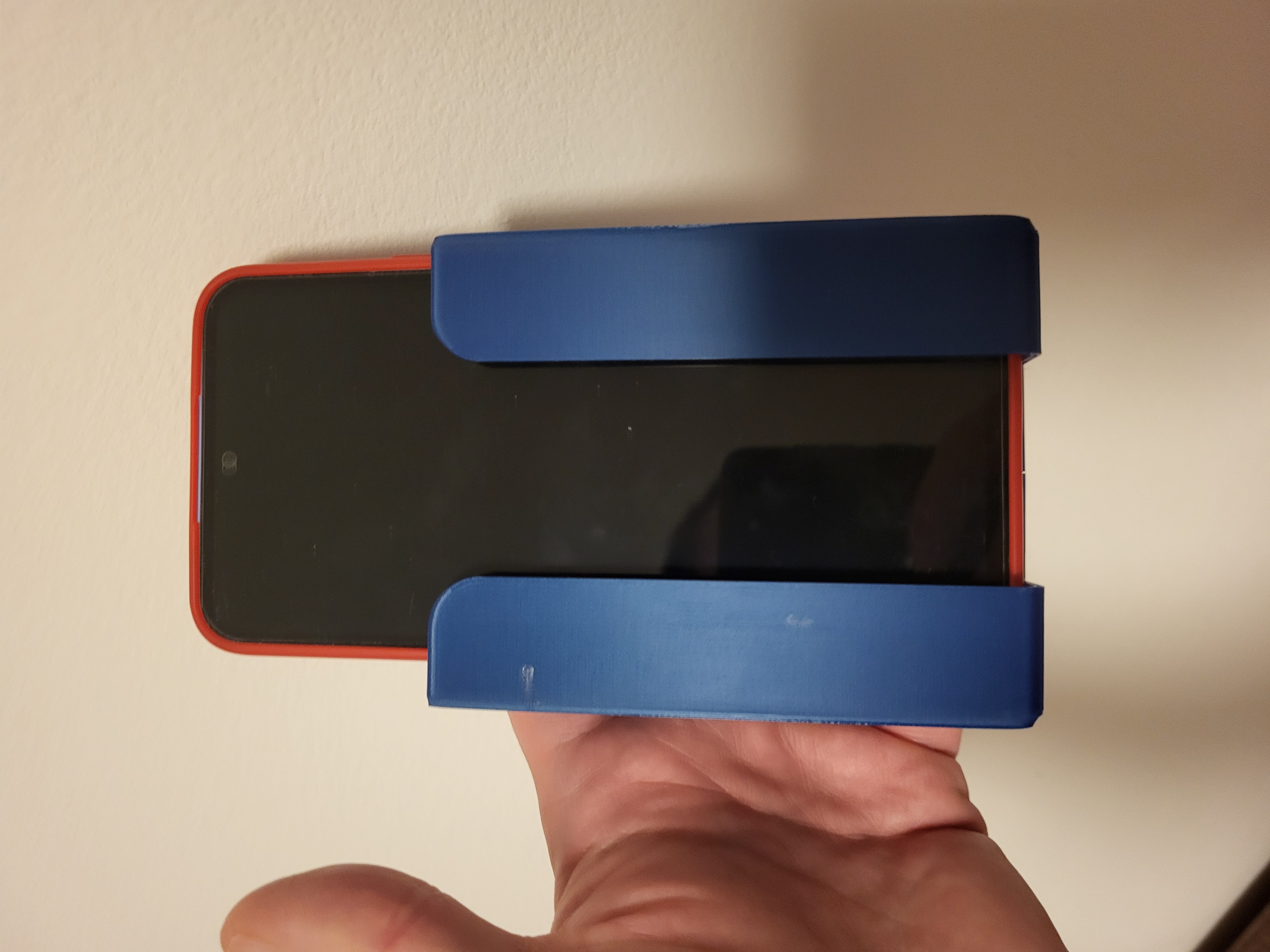 Mobile phone holder for bed
