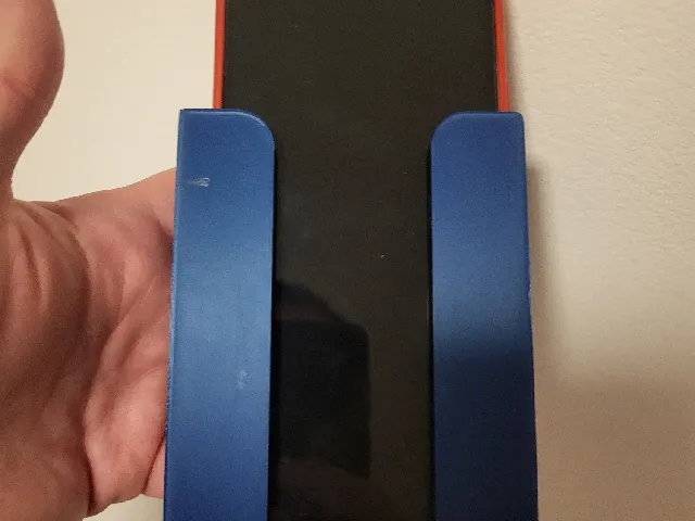 Mobile phone holder for bed