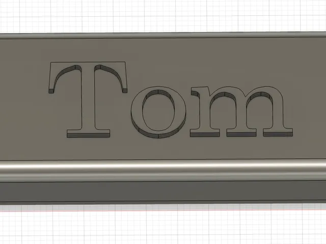 Tom keyring