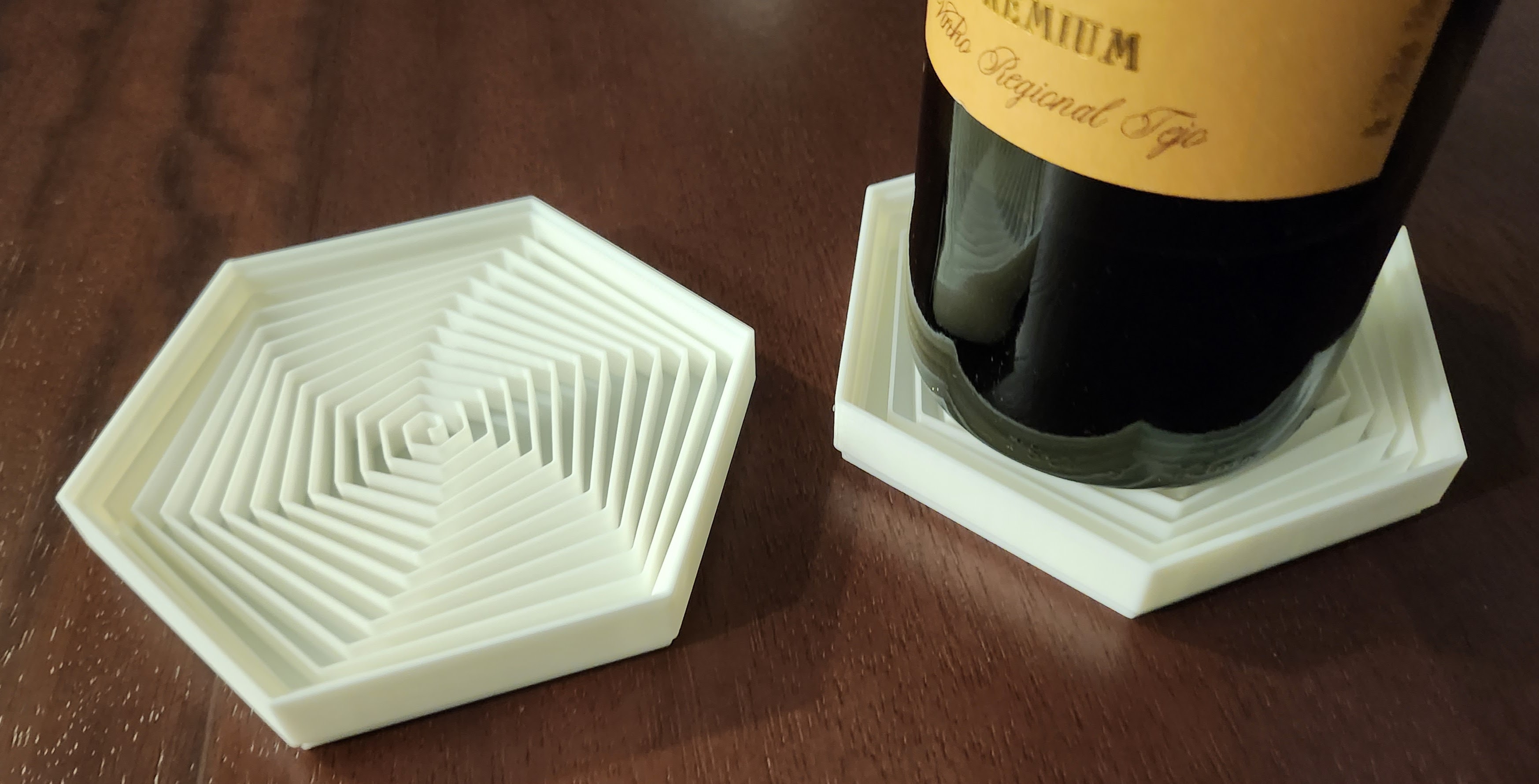 Stackable hex coaster for wine, champagne, large water bottles