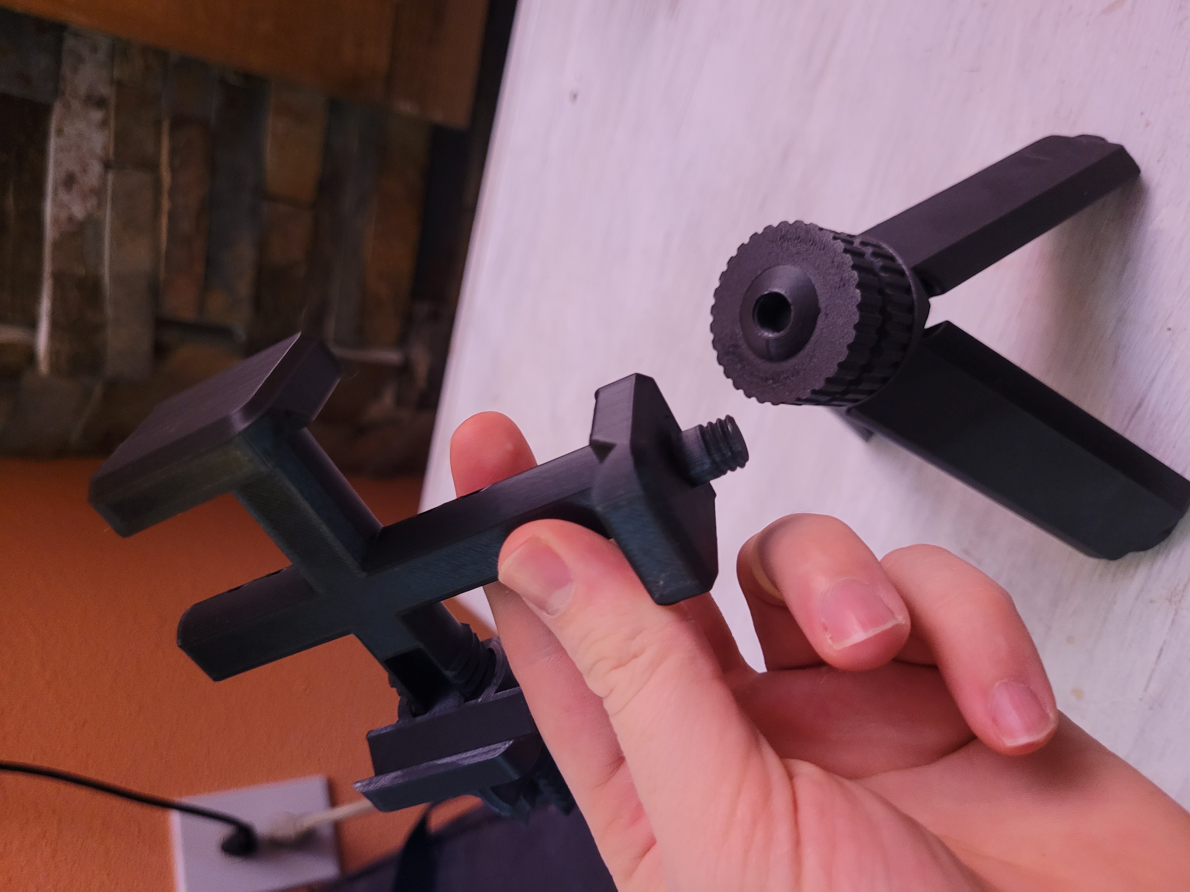 Adjustable tripod phone holder