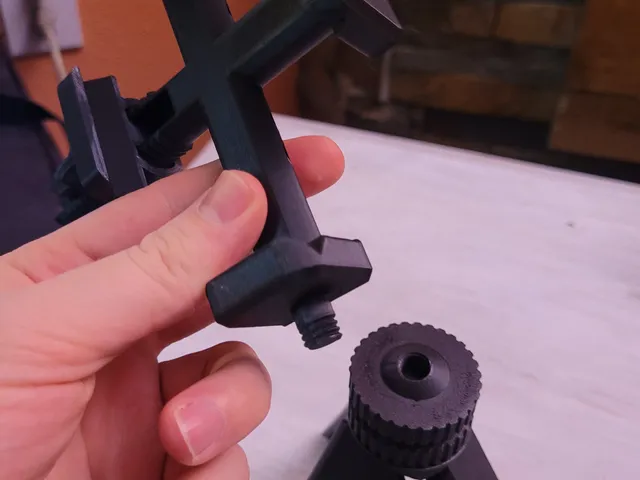 Adjustable tripod phone holder