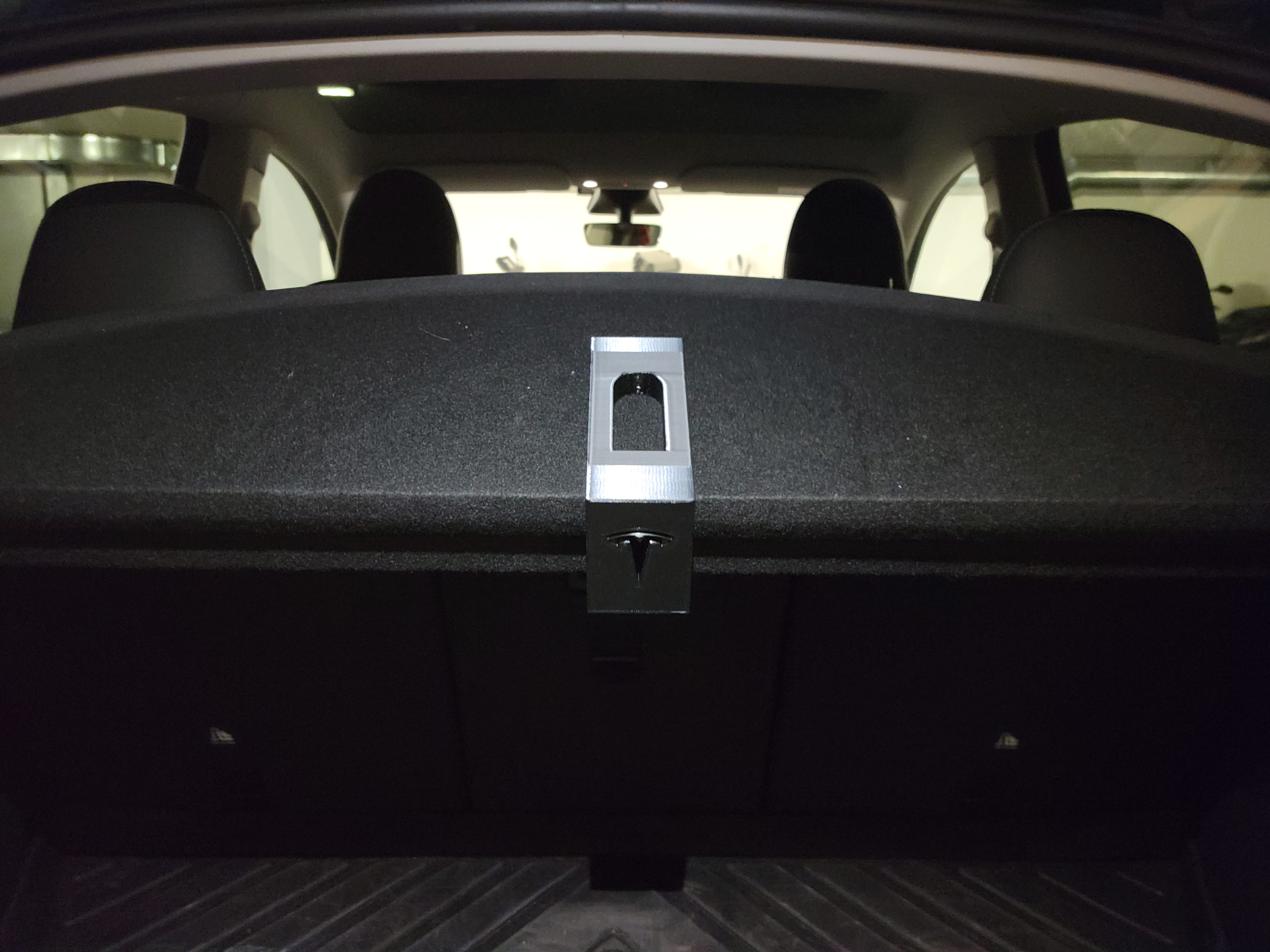 Rear deck clamp for TESLA model Y