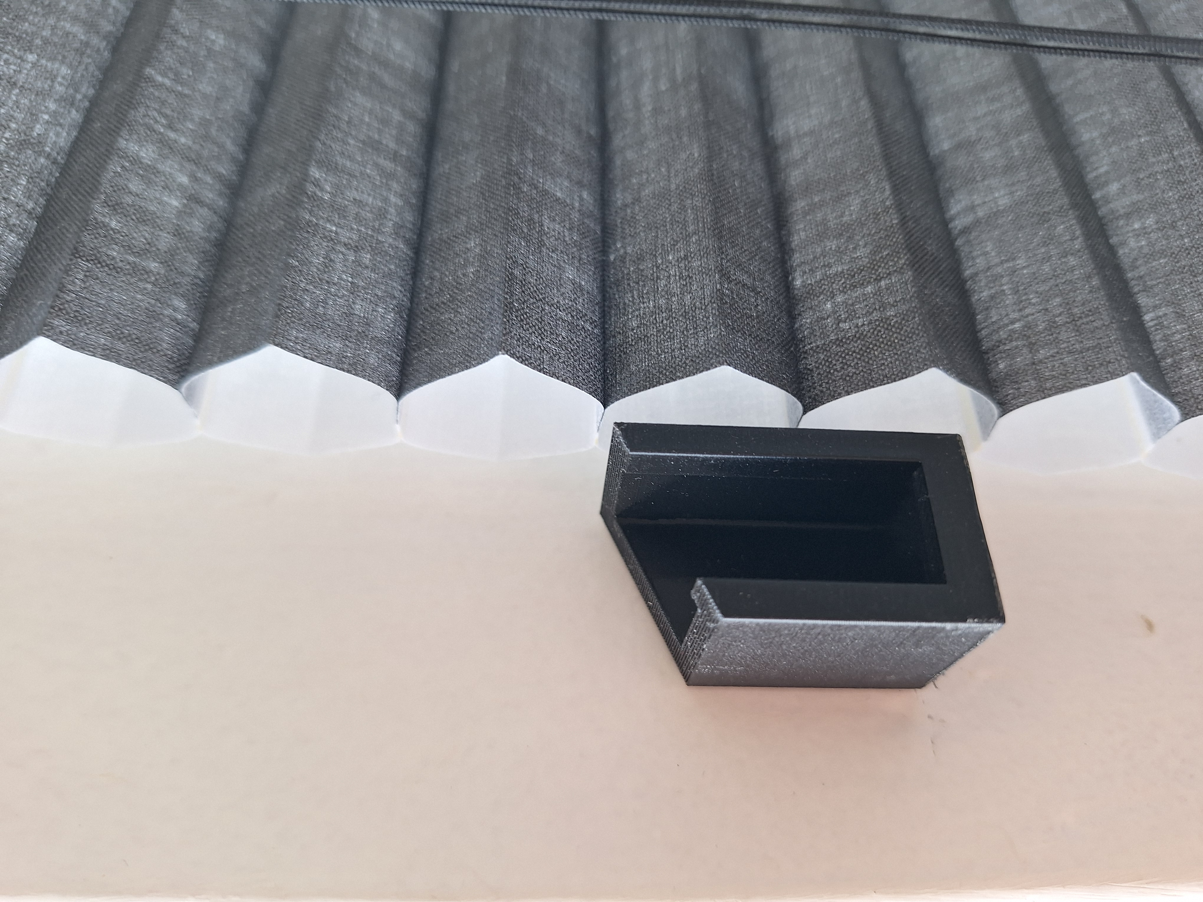 Holder for Luxaflex cord weight replacement