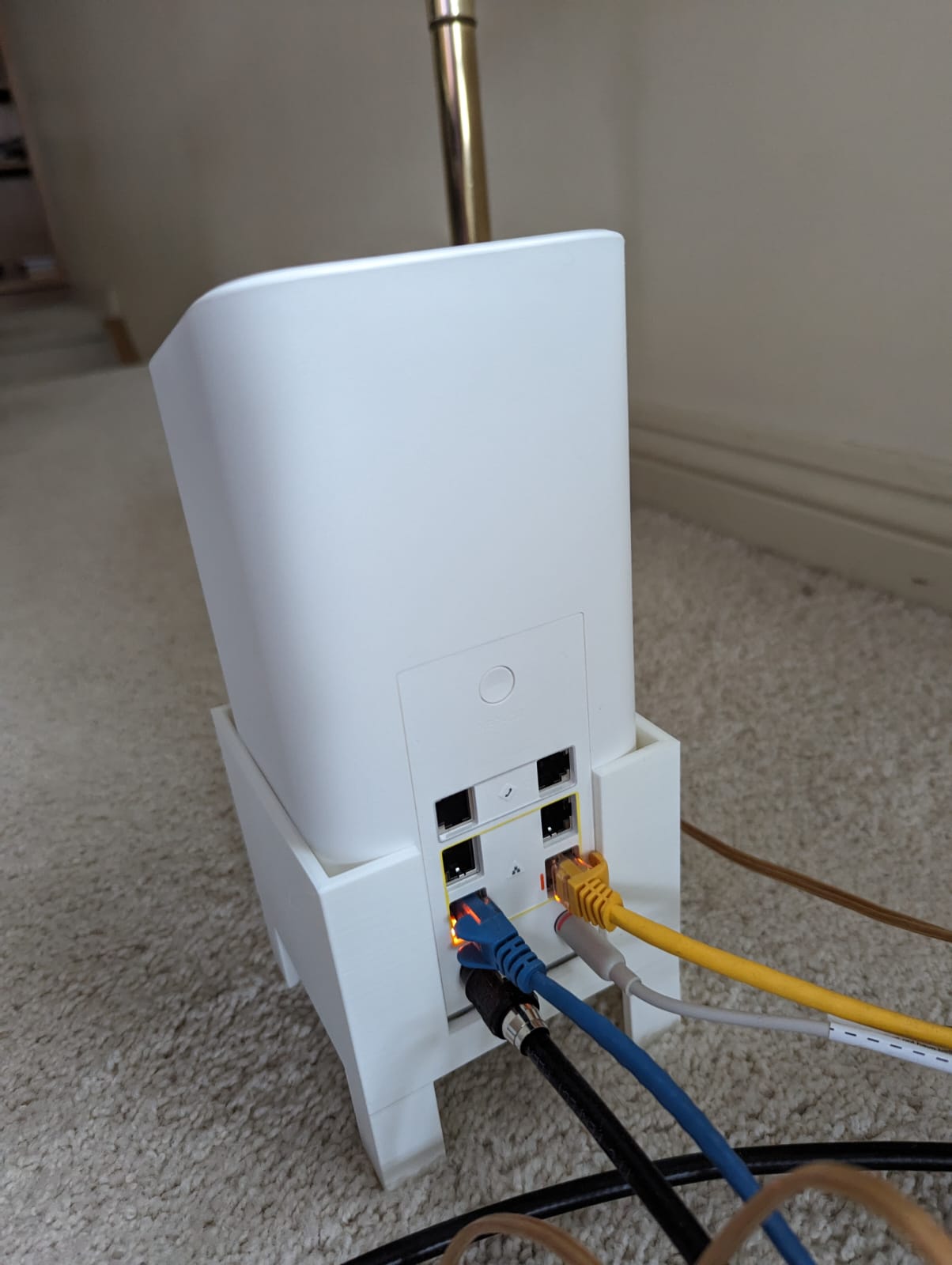 WiFi Modem Stand (TG4482) by Rayd Download free STL model