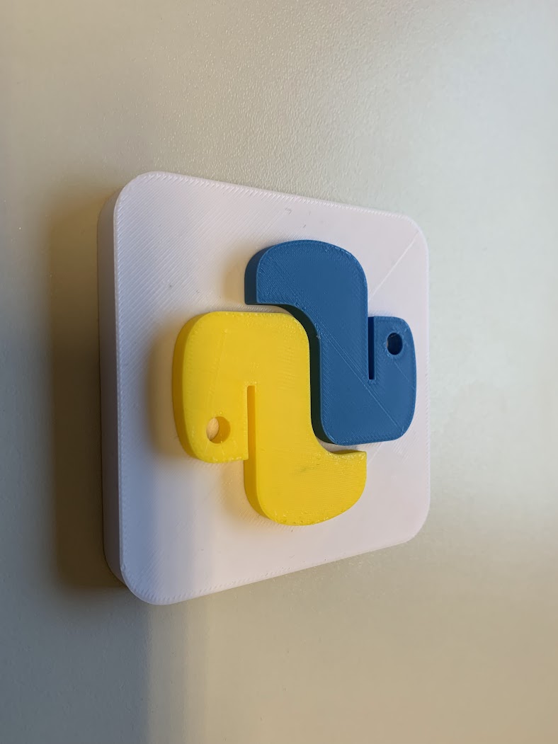 The Python Logo w/base plate by Kjallakr76 | Download free STL model ...