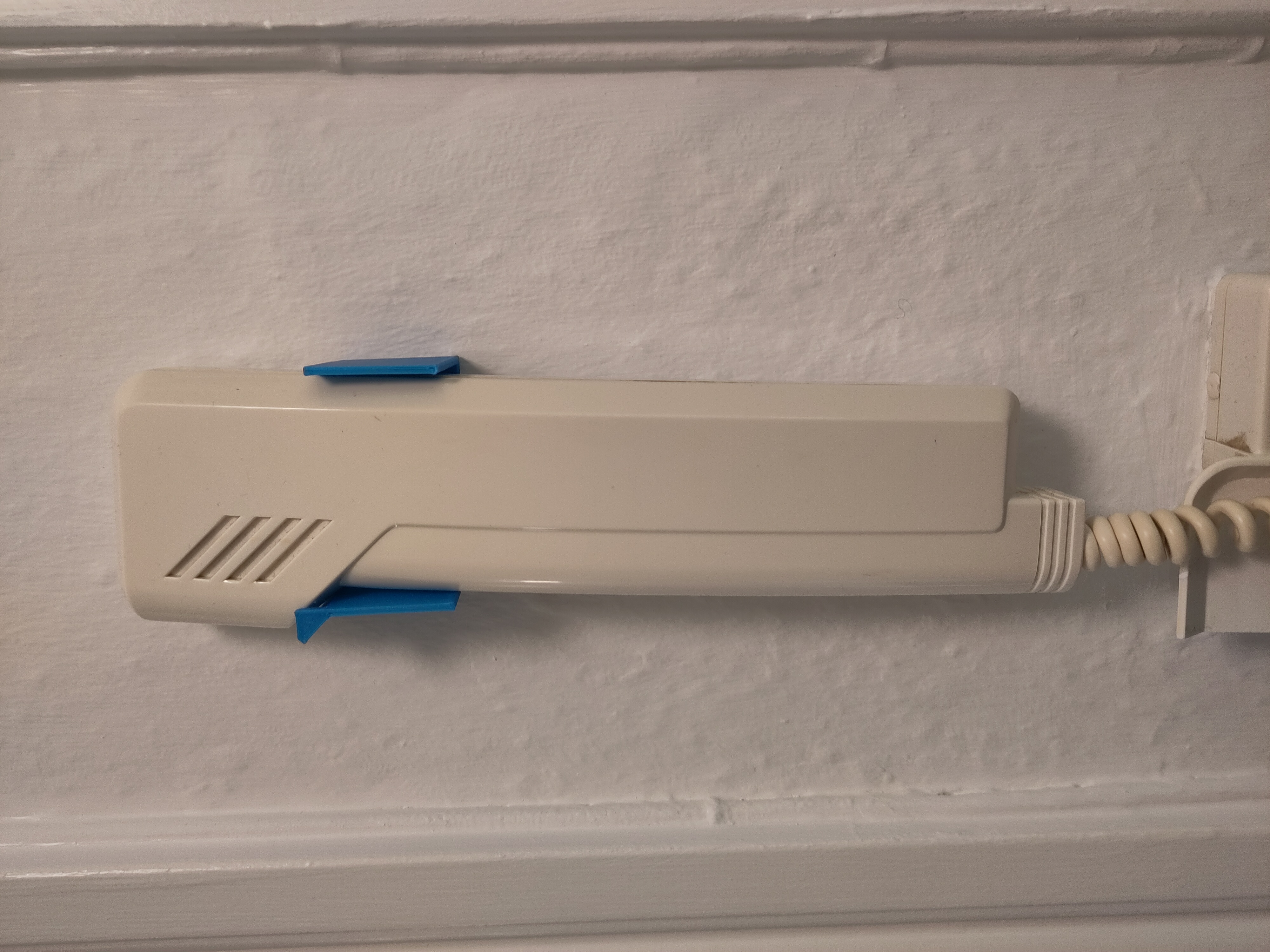 Intercom phone holder