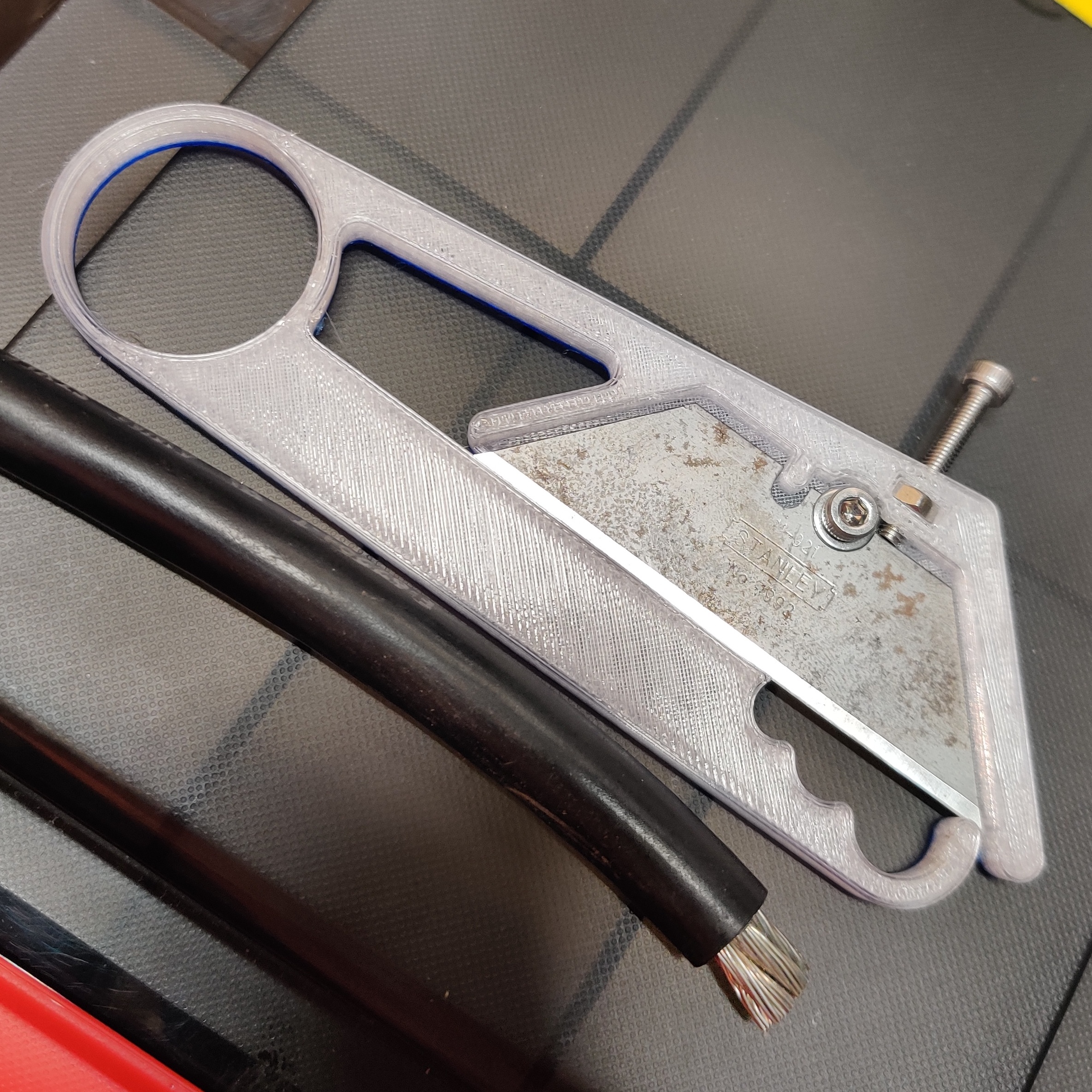 Adjustable wire stripper for Stanley utility blade